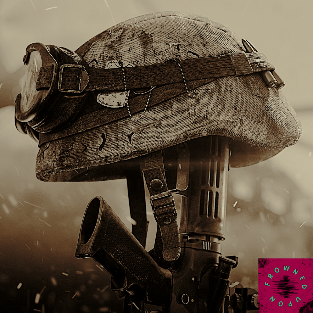Close-up of a weathered military helmet with goggles strapped on, resting atop a rifle in a sepia-toned image.